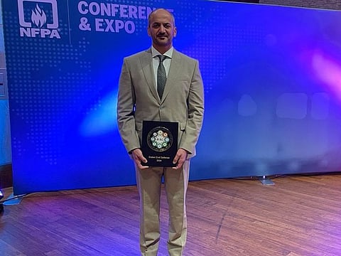 Major General Jamal bin Adeith Almehairi accepting the award for DCD