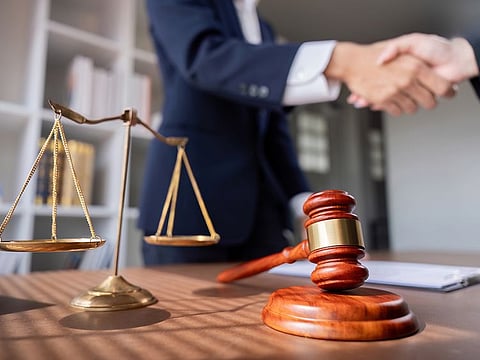 According to the UAE's Constitution, everyone should have easy access to a competent lawyer. Picture used for illustrative purposes