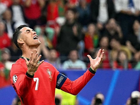 Portugal's forward #07 Cristiano Ronaldo reacts during the UEFA Euro 2024 round of 16 football match between Portugal and Slovenia at the Frankfurt Arena in Frankfurt am Main on July 1, 2024.