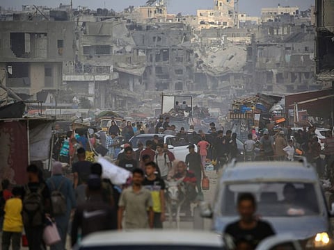 Displaced Palestinians from areas in east Khan Younis flee after the Israeli army issued a new evacuation order for parts of the city and Rafah, in the southern Gaza Strip on July 2, 2024.