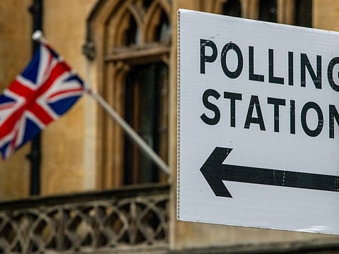 A sign for a polling station in Westminster ahead of the UK general election, in London, on July 2, 2024. The crop of eccentrics running in Thursday’s vote includes an AI chatbot, an actual pub and an intergalactic space lord.
