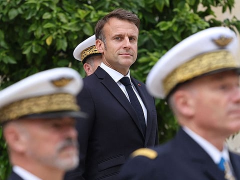 France's President Emmanuel Macron attends a ceremony to review troops that will take part in the July 14th Bastille Day parade in Paris on July 2, 2024.