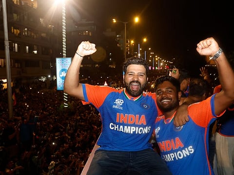Sanju Samson (right), who is celebrating the World Cup triumph with skipper Rohit Sharma during the parade in Mumbai, will miss the first two games against Zimbabwe.