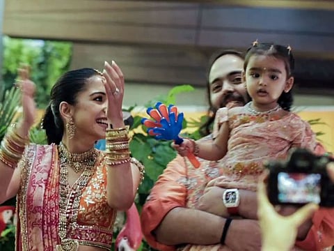 Reliance Industries Chairman Mukesh Ambani's son Anant Ambani and his fiancé Radhika Merchant during the 'Mameru ceremony' ahead of their wedding, at their residence Antilia in Mumbai on Wednesday.