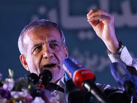 Iranian reformist candidate Masoud Pezeshkian speaks during his campaign rally, two days before a presidential election runoff following a first round marked by a historically low turnout, at a stadium in Tehran on July 3, 2024