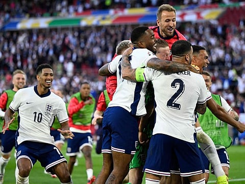 (From left) England's midfielder Jude Bellingham, forward Ivan Toney, goalkeeper Jordan Pickford, forward Harry Kane and defender Trent Alexander-Arnold celebrate after winning the Uefa Euro 2024 quarter-final football match against Switzerland at the Duesseldorf Arena in Duesseldorf on Saturday.