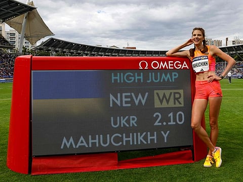Yaroslava Mahuchikh poses after beating a world record in the women's high jump event during the "Meeting de Paris" Diamond League athletics meeting at the Charlety Stadium in Paris on Sunday.