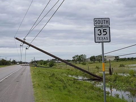 Damaged power lines along Texas State Highway 35 after Hurricane Beryl made landfall near Bay City, Texas.