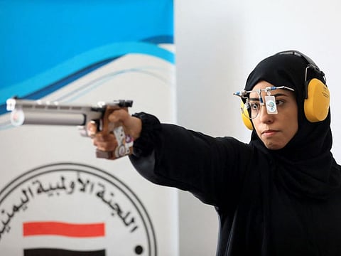 Yemeni air pistol Olympic athlete Yasameen Al Raimi attends a training session in Sanaa on July 2.