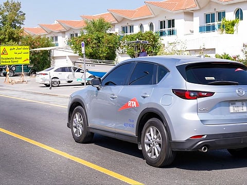 During a pilot run of the tech in Dubai, approaching a boat parked on the roadside as well as a roadworks sign