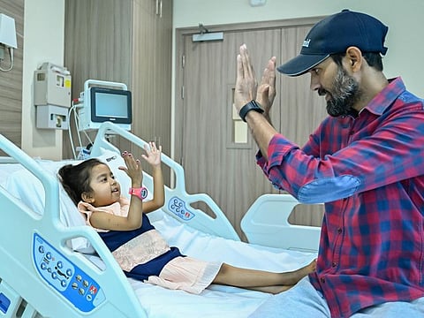Imran Khan, 40, with his daughter Razia, 4, after the successful living donor liver transplant at Burjeel Medical City in Abu Dhabi.