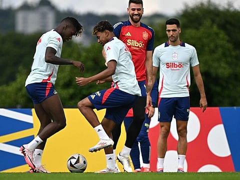 (From left) Spain's midfielder Nico Williams and forward Lamine Yamal along with teammates take part in a training session at the team's base camp in Donaueschingen, on Thursday.