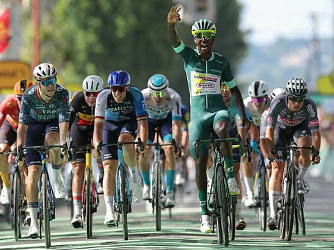 Intermarche - Wanty team's Eritrean rider Biniam Girmay wearing the sprinter's green jersey sprints past the finish line to win the 12th stage of the 111th edition of the Tour de France cycling race on Thursday.