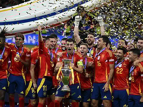 Spain's Alvaro Morata (centre) celebrates with teammates after winning the Euro 2024 final against England in Berlin on Sunday.