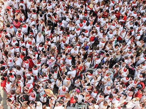 Global population is expected to hit its “peak” in the mid-2080s at around 10.3 billion people; it will then plateau before a gradual decline sets in. Another economist thinks that, given declining birth rates and changing social norms, 'peak population' will actually come sooner than current UN estimates. A scene from the festival of San Fermin in Spain.