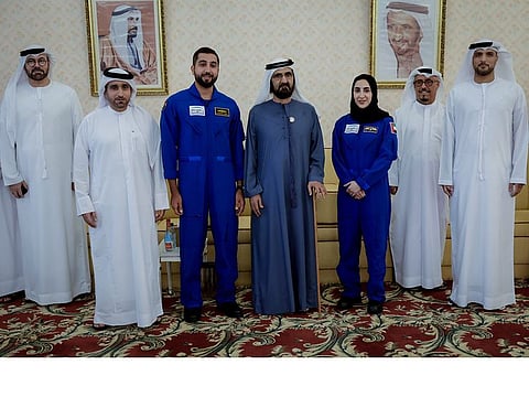 His Highness Sheikh Mohammed bin Rashid Al Maktoum, Vice President and Prime Minister of the UAE and Ruler of Dubai, with Emirati astronauts Nora Al Matrooshi and Mohammad Al Mulla at the Union House in Dubai on Monday