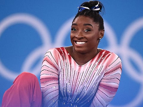 USA's Simone Biles waits ahead of the artistic gymnastics women's balance beam final of the Tokyo 2020 Olympic Games at Ariake Gymnastics Centre in Tokyo on August 3, 2021.