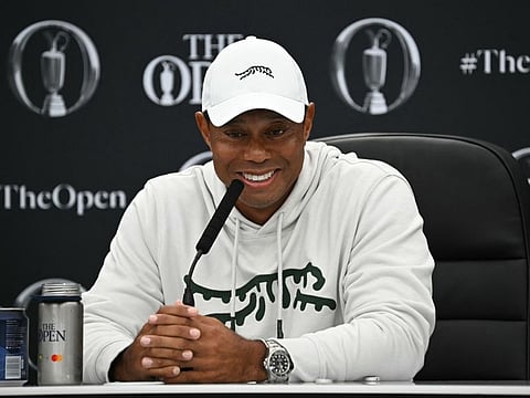 US golfer Tiger Woods smiles during a press conference held ahead of the 152nd British Open Golf Championship at Royal Troon on the south west coast of Scotland on Tuesday.
