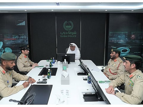 Dubai Police officials at a meeting on the reception of calls on 999 and 901.