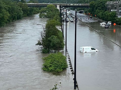 Videos showed cars submerged in downtown Toronto and at a standstill on Lake Shore Boulevard, the major artery that runs alongside Lake Ontario.