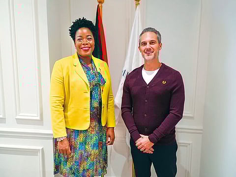 Jeremy with Charmaine Quinland-Donovan, CEO, Antigua and Barbuda Citizenship by Investment Unit