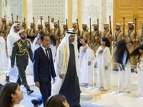 His Highness Sheikh Mohamed bin Zayed Al Nahyan, President of the United Arab Emirates (center R), receives Joko Widodo, President of Indonesia (center L), during a state visit reception at Qasr Al Watan.