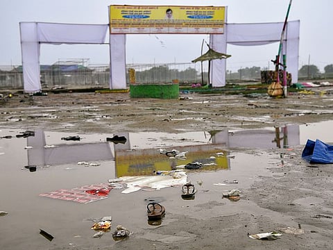 Slippers seen scattered at the Hathras stampede incident site which left 121 people dead in Hathras.
