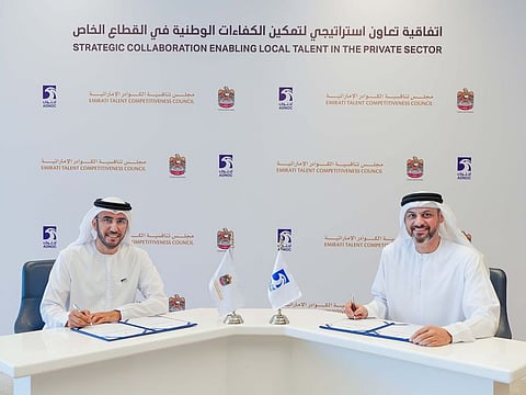 Officials from ADNOC and the Emirati Talent Competitiveness Council (ETCC) during signing ceremony of an agreement to create 13,500 new private sector jobs.