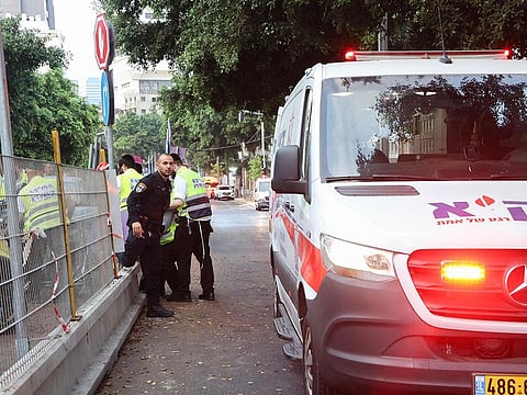 Team members from the ZAKA Search & Rescue at the scene of the explosion in Tel Aviv.