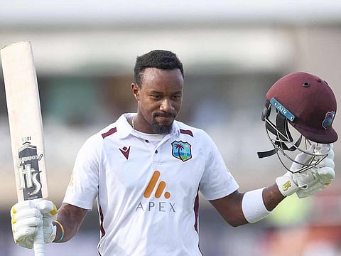 West Indies' batsman Kavem Hodge celebrates his century on the second day of the second Test cricket match against England at Trent Bridge in Nottingham on July 19, 2024.