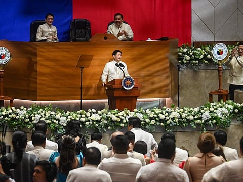Philippine President Ferdinand Marcos is applauded during the annual State of the Nation Address at the House of Representatives in Manila on July 22, 2024.