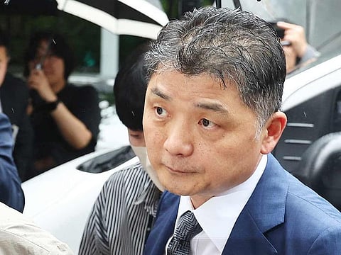 Kim Beom-su, founder of South Korean internet company Kakao, arrives at a court in Seoul on July 22, 2024.