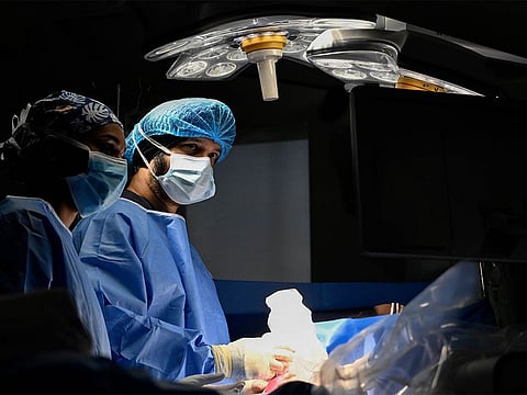 Dr Mandeep Singh performing the in-utero surgery.