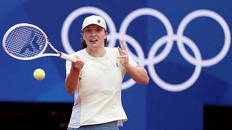 Poland's Iga Swiatek takes part in a training session at the Roland-Garros Stadium complex in Paris on Tuesday.