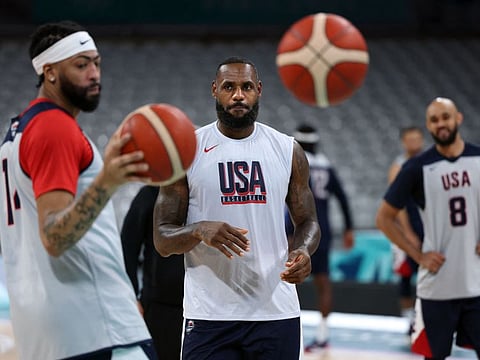 US forward LeBron James (centre) takes part in a training session at the Pierre-Mauroy stadium in Villeneuve-dAscq, northern France, on Wednesday.