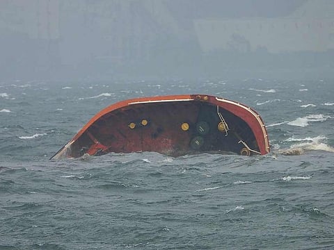 This handout photo taken on July 25, 2024 and received from the Philippine Coast Guard (PCG) shows part of MT Terra Nova oil tanker after it sank off Manila Bay.