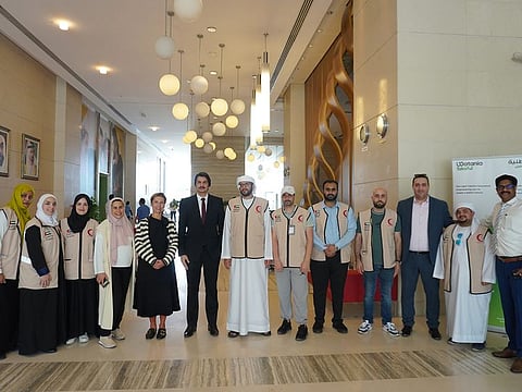 Watania Takaful staff with Emirates Red Crescent volunteers
