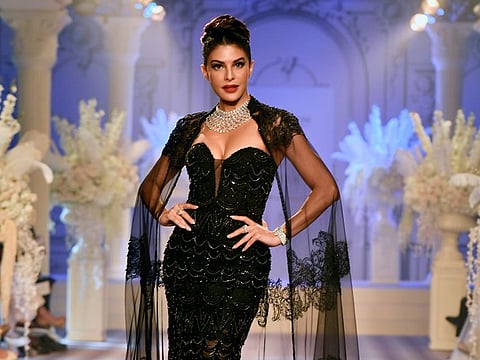 Bollywood actress Jacqueline Fernandez showcases the 'Art of Eternity' collection by designer Isha Jajodia as she walks the ramp as the showstopper for the Rose Room at the Fashion Design Council of India's (FDCI) India Couture Week 2024, in New Delhi on Thursday.