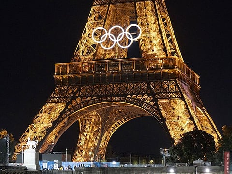 The Olympic rings on an illuminated Eiffel Tower, ahead of the Olympic Games in Paris, France, on Tuesday, July 23, 2024.