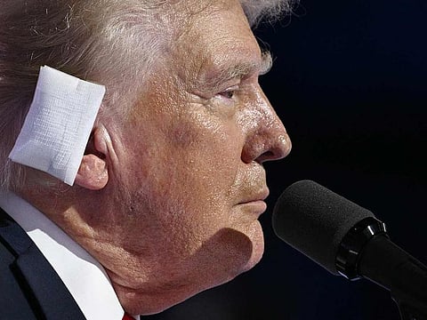 File photo:  US former President and Republican presidential candidate Donald Trump, a bandage on his ear after he was injured during an assassination attempt, speaks onstage during the last day of the Republican National Convention at the Fiserv Forum in Milwaukee, Wisconsin, on July 18, 2024.