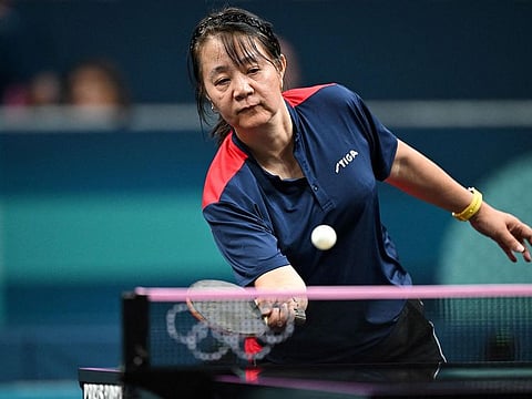Chile's Zhiying Zeng plays a return to Lebanon's Mariana Sahakian during their women's table tennis singles preliminary round at the Paris 2024 Olympic Games at the South Paris Arena in Paris on July 27, 2024.