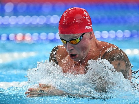 Britain's Adam Peaty competes in a semi-final of the men's 100m breaststroke swimming event at the Paris 2024 Olympic Games at the Paris La Defense Arena on Saturday