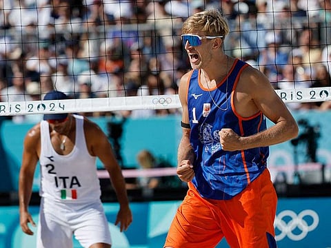 Netherlands' #01 Steven Van De Velde during the men's pool B beach volleyball match between Netherlands and Italy during the Paris 2024 Olympic Games at the Eiffel Tower Stadium in Paris on July 28,