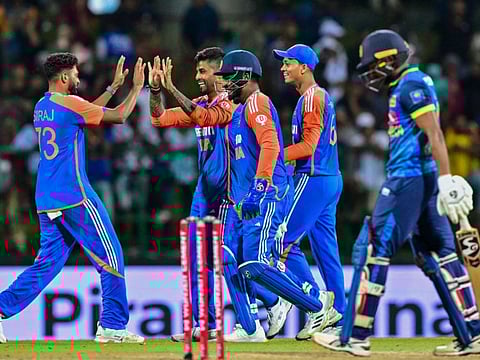 India's captain Suryakumar Yadav (2L) celebrates with teammates after taking the wicket of Sri Lanka's Kamindu Mendis during the third and final Twenty20 international cricket match between Sri Lanka and India at Pallekele International Cricket Stadium in Kandy on Tuesday.