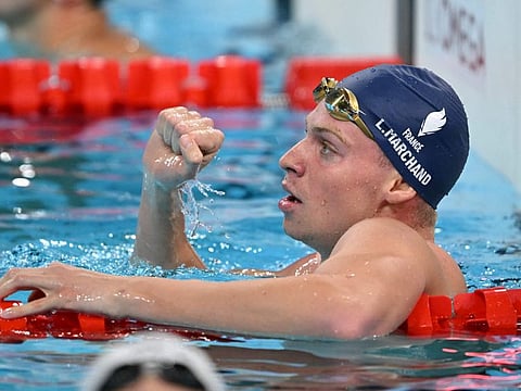France's Leon Marchand wins his second gold in the men’s 200m butterfly, adding to his dazzling victory in the 400m medley.