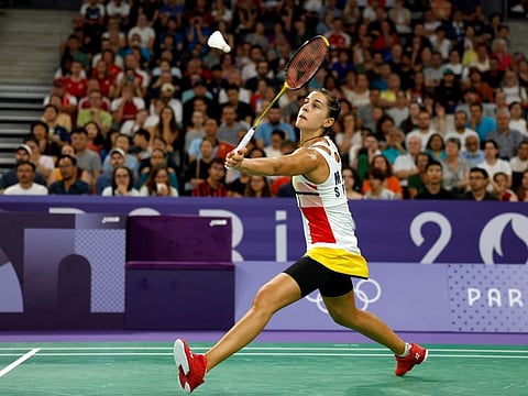 Spain's Carolina Marin in action against Ireland's Rachael Darragh in their women's singles badminton group stage match during the Paris 2024 Olympic Games at Porte de la Chapelle Arena in Paris on Wednesday.