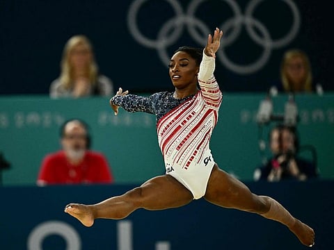 US' Simone Biles competes in the floor exercise event of the artistic gymnastics women's team final during the Paris 2024 Olympic Games at the Bercy Arena in Paris, on July 30.