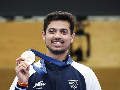 Bronze medallist India's Swapnil Kusale poses on the podium during the award ceremony for the 50 Rifle 3 Positions men's final during the Paris 2024 Olympic Games at Chateauroux Shooting Centre on Thursday.