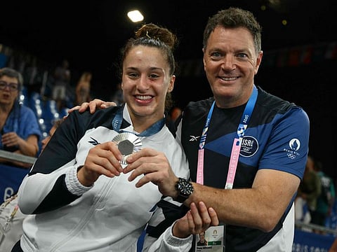 Silver medallist Israel's Inbar Lanir celebrates with Shany Hershko Israeli judo coach after the podium of the judo women's -78kg gold medal bout of the Paris 2024 Olympic Games at the Champ-de-Mars Arena, in Paris on Thursday.