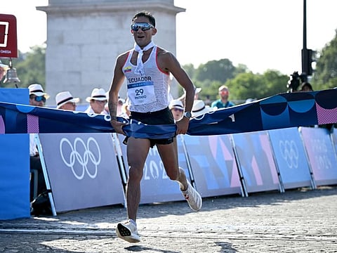Ecuador's Brian Daniel Pintado crosses the finish line to win the men's 20km race walk of the athletics event at the Paris 2024 Olympic Games at Trocadero in Paris on Thursday.
